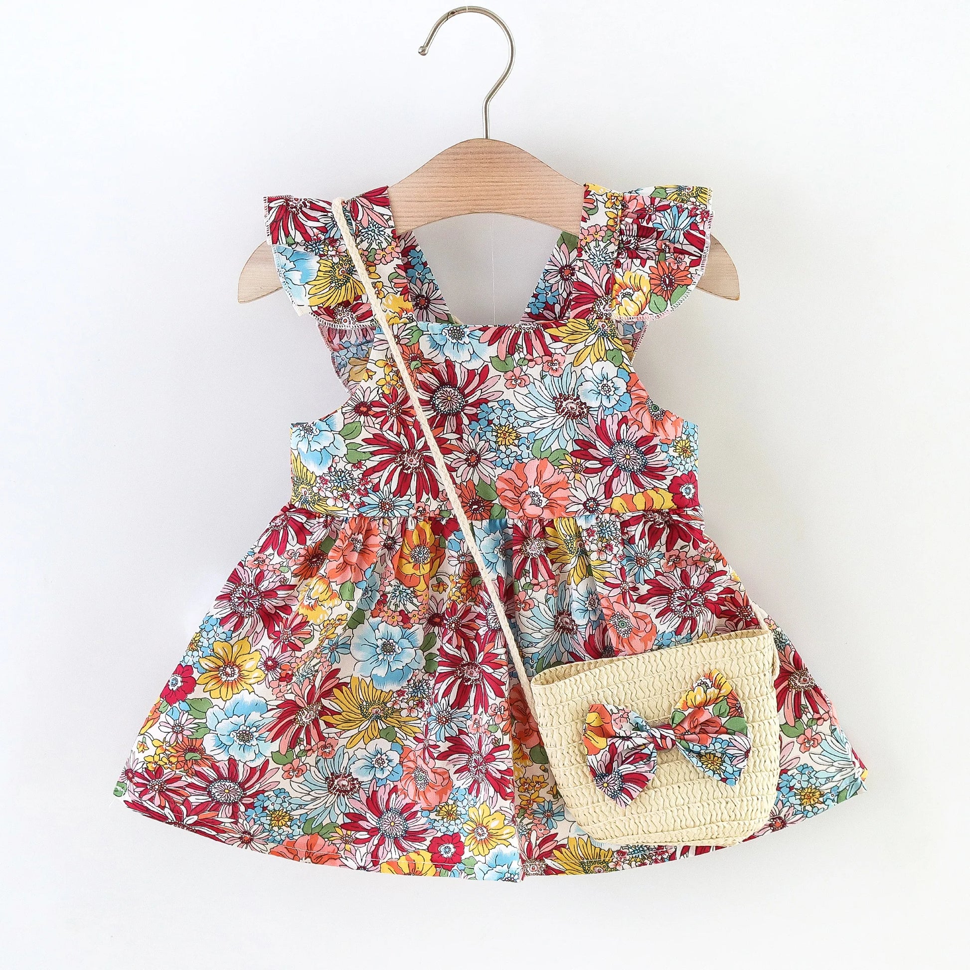Girl’s 2-piece outfit with floral dress and crossbody bag, designed for toddler summer wear in Australia.