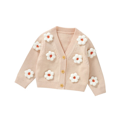 Knitted baby girls cardigan with daisy flower pattern
