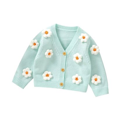 Knitted baby girls cardigan with daisy flower pattern