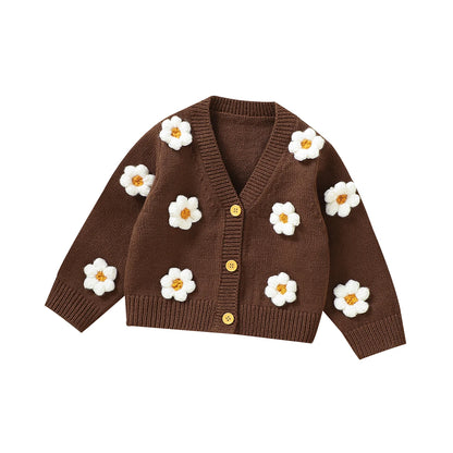 Knitted baby girls cardigan with daisy flower pattern