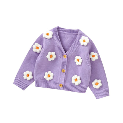 Knitted baby girls cardigan with daisy flower pattern