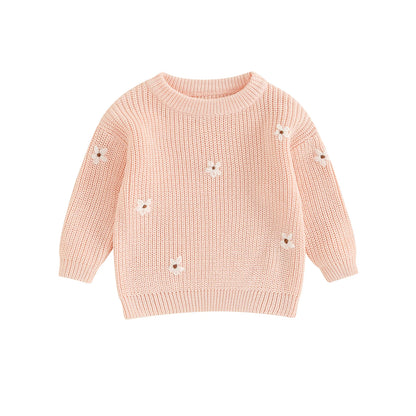 A soft knitted sweater with colourful flower print, round neck and full sleeves.