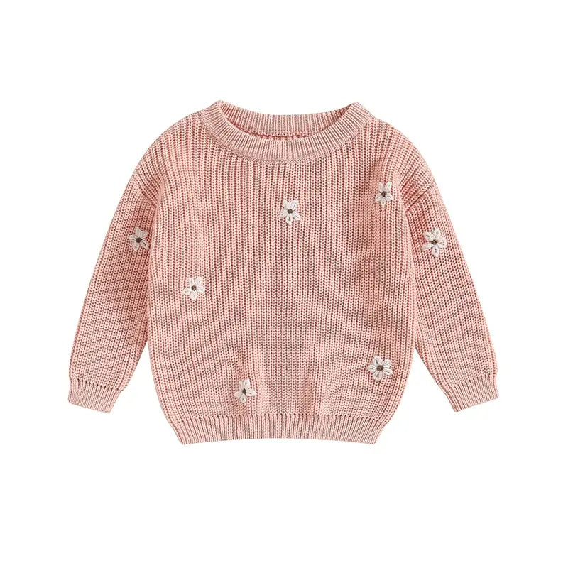 A soft knitted sweater with colourful flower print, round neck and full sleeves.